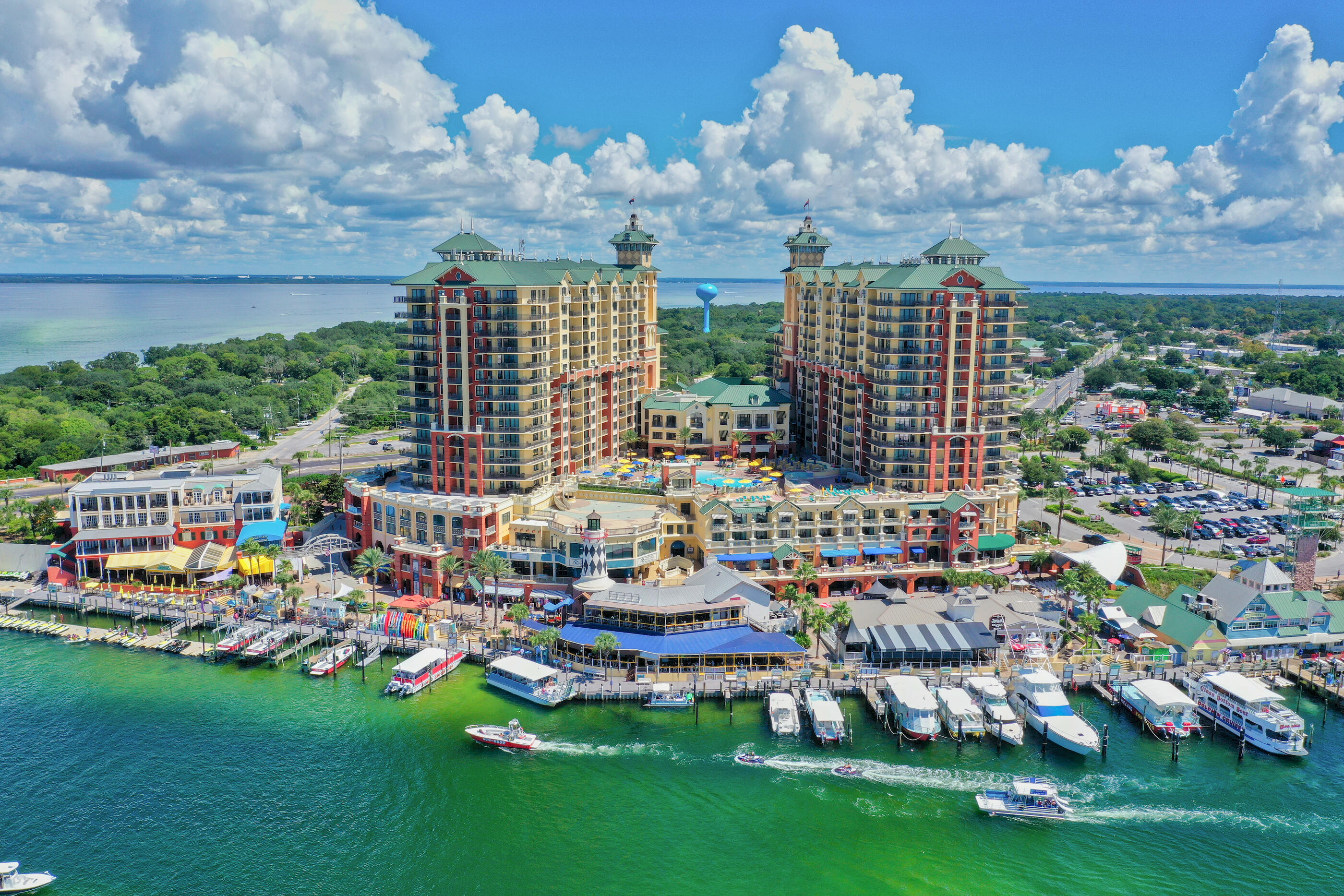 Step into the ultimate Destin lifestyle with this stunning 2-bedroom + bunk room, 2-bath condo at Emerald Grande, Destin's premier resort. Imagine starting your day with coffee and panoramic views of the East Pass and Gulf of Mexico, then taking a quick elevator ride down to HarborWalk Village -- where shopping, dining, and endless entertainment are right outside your door. Inside, an open floor plan frames the sparkling water views, while the spacious balconies invite you to relax in style. This condo comes fully furnished and rental-ready, making it perfect for personal escapes or income potential. HVAC was replaced in 2022. From unforgettable sunsets to the energy of HarborWalk's festivals and fireworks, this is more than a property -- it's a front-row seat to the best of Destin.