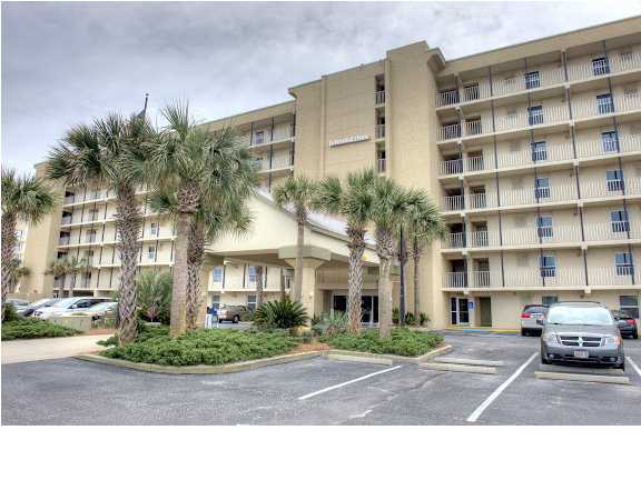 Beautifully decorated gulf front unit. Convenient to pool, dune walkover, beach and swimming in the Gulf. This unit has renovated open kitchen with breakfast bar, enlarged hall closet, doorway to master bedroom relocated, master bath enlarged with double vanity and washer/dryer in the unit. This condominium has newer furnishings, many pieces of beautiful original artwork and decorator items, custom bedspreads, window coverings and many other upgrades. HVAC replaced in 2005. Such a convenient location - park right outside your door. Don't buy until you have seen this condo! Buyer to verify room measurements and all info important to a buyer.