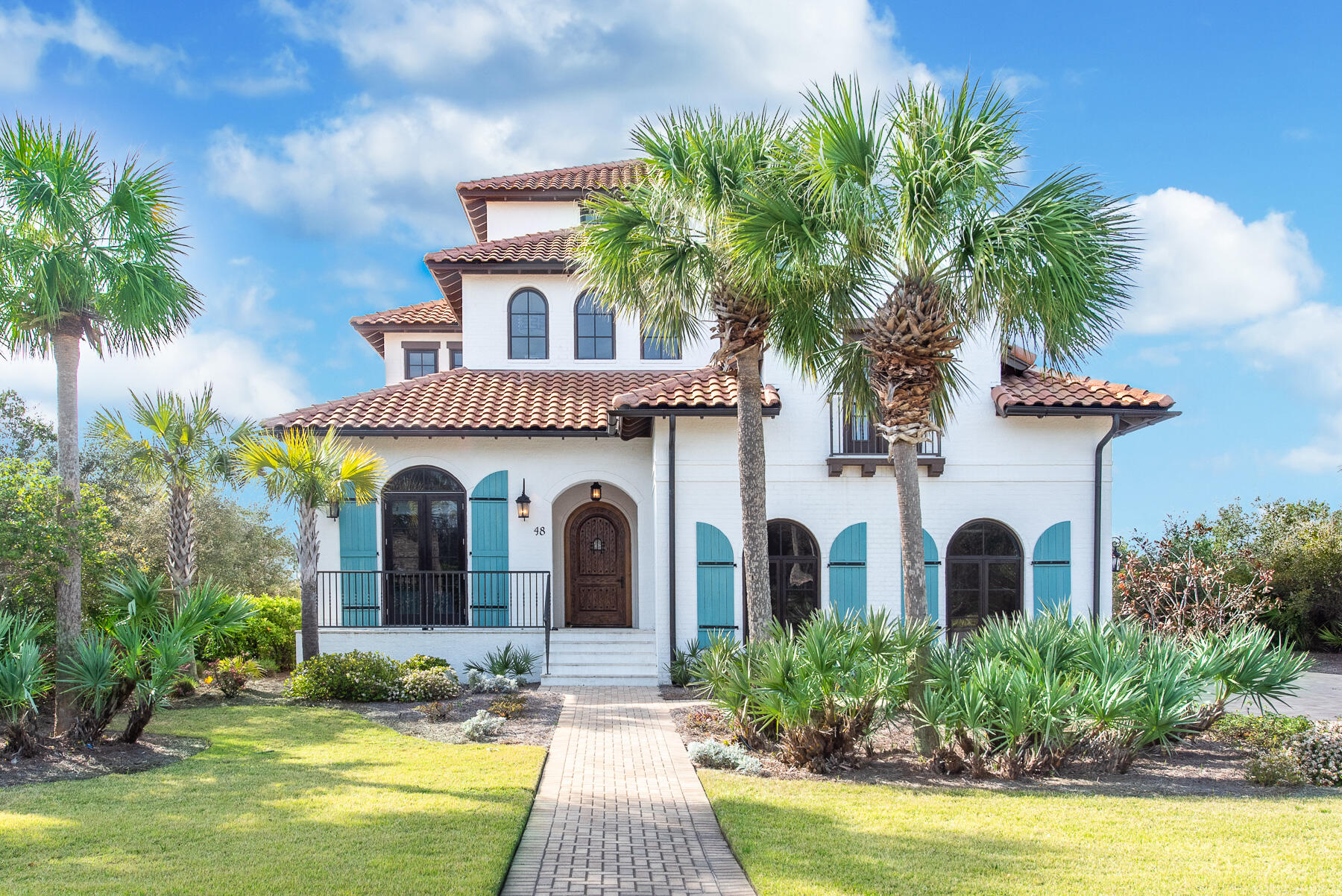 Beautiful custom home in the private gated neighborhood of Paradise by the Sea, 30A's most desirable neighborhood. This home was spaciously designed and equipped with upgrades to satisfy any home owners desires. The large master suite as well as the main living area are found on the ground level. The open concept kitchen/living/dining area opens to a backyard oasis through a wall of glass sliders. A summer kitchen and large outdoor dining area lead to home's luxurious and unique private heated pool and spa. The home sits on just over a 1/4 acre lot and is full of beautiful tropical landscaping.