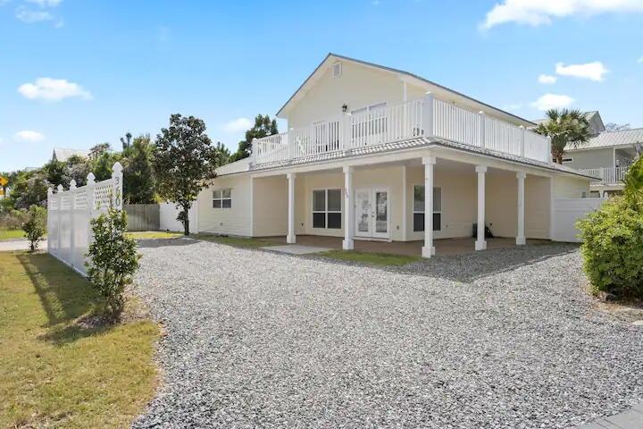 INVESTORS, TAKE NOTE: 100% bonus depreciation eligible with a cost segregation study! Consult your CPA for details and requirements. This is a PROVEN INCOME-PRODUCING PROPERTY! WHY YOU WILL LOVE 360 S HOLIDAY ROAD - YOUR HOLIDAY HAVEN: INTERIOR FEATURES
-- Open concept first floor with spacious living and dining area
-- Modern kitchen with ample counter space and seating
-- First-floor laundry room
-- First floor includes two king bedrooms and one full bathroom with shower
-- Second floor includes one king bedroom, one queen bedroom, and one full bathroom
-- Unique bunk space with two full-over-full bunk beds
-- Second floor features wraparound deck access from sliding doors
-- Fresh, fun, modern interior design throughout
EXTERIOR FEATURES
-- Just 300 feet from beach access at Holiday Rd Gate
-- Fully fenced, private backyard
-- Stock tank-style filtered pool
-- Hot tub
-- Fire pit with seating area
-- 100'' outdoor movie screen and backyard theater setup
-- Large, sunny deck perfect for entertaining or relaxing
-- Cozy Adirondack chairs on wraparound upper deck
-- Parking for 3 vehicles (depending on size)
-- No HOA - bring your boat, trailer, or RV and park on property