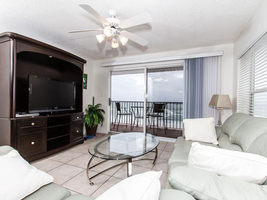 This 4th floor 2 bedroom condo sleeps 6 . It's located at The Palms Condominiums on beautiful Okaloosa Island and it is DIRECTLY ON THE BEACH! You are just a few steps away from the beautiful sugar-white sand and emerald green waters. The master bedroom of this condo is on the beach side with access to the beach front balcony. Gorgeous views greet you as soon as you wake up in the morning! Another entry to the balcony is from the beach front living room. The kitchen is fully equipped with all major appliances and cookware, there is a washer / dryer in the condo for your laundry needs. Two full bathrooms make it easy for everyone to get ready. Covered parking!