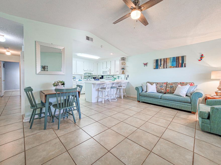 Phenomenal location one block from the Beach, Pier Park, and Scenic Hwy 30A! Largest 1-Bedroom floor plan in the community. Open concept with a large kitchen with a breakfast bar overlooking the spacious living area! Can sleep 6 easy!  Large Master Suite with dressing area and vanity!  AC, Stackable Washer & Dryer, Refrigerator 2021, Water Heater, and toilets 2021 in the bathrooms! The bathrooms are freshly painted.The perfect vacation rental or second home! It has made 17K+ between April-October this year, not including owner usage. This condo is an upstairs unit with large outdoor living space on the balcony which affords a spacious seating area, overlooking the courtyard! Fabulous Amenities include 5 Community pools, Basketball, Tennis Courts, Mini Golf & More!