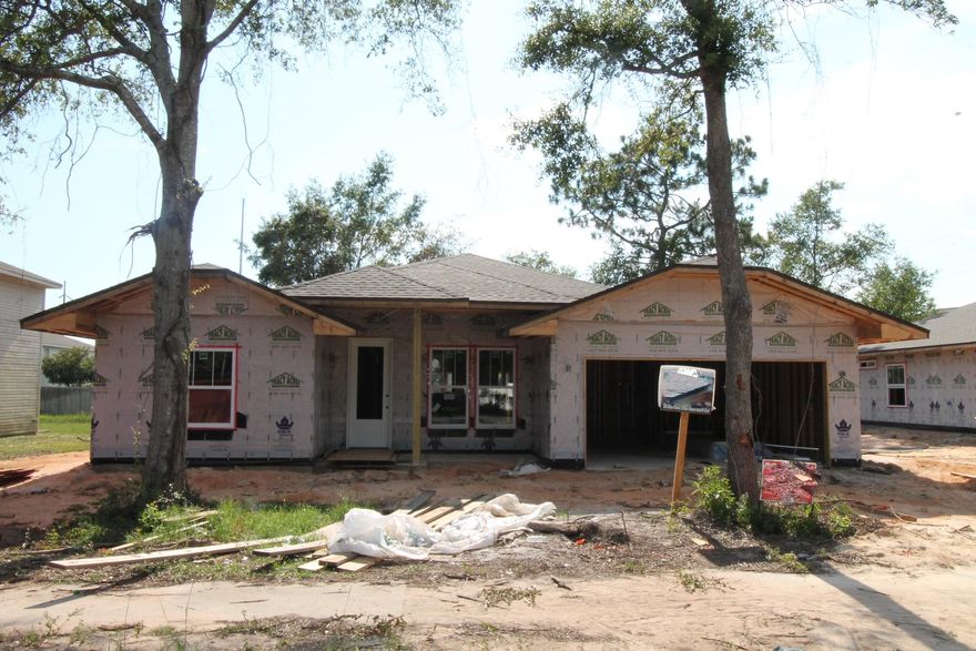 Awesome floor plan offered by 2017, Parade of Homes, winning builder! This 4/3 custom brick home has super curb appeal, and is being constructed on large lot. There are 10 Ft. Ceilings w/ impressive crown molding, will have tile flooring throughout the main living and wet areas, and 5 1/4'' baseboard throughout. As you enter the home, through the covered front porch, the formal dining room is on your right. As you continue down the hallway, you will then enter the chef's delight kitchen which will boast custom maple cabinetry, granite countertops, 2 large pantry's, and stainless appliances (including an oversized commercial grade frig./freezer). This plan is a split bedroom, where bedrooms 1 - 3, and baths 1 and 2, are located at the right of the home. The master suite is in the rear of the home, is very roomy, has 2 large walk - in closets, a custom tiled walk - in shower with class enclosure, a whirlpool garden tub, a double vanity and a linen closet. The laundry room is conveniently located at the rear of the kitchen. The greatroom is located at the rear of the kitchen, and opens to a covered porch, which is perfect for entertaining. The yard will be beautifully landscaped, have a privacy fence, and comes complete w/ a  sprinkler system and timer. Insurance will be very reasonable, as home is built to today's code. Home has a Taexx ''in the wall'' pest control system, that is serviced from the exterior of the home, for owner's convenience. Completion is expected in late September.