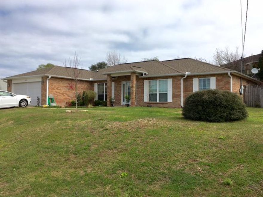 Come see this all brick 3-4 bedroom home, located south of I-10 with large family room, well equipped kitchen with stainless appliances and island, breakfast nook, dining room and the 4th bedroom can be an office or bedroom! Home has a split bedroom plan with the master bedroom and bath with separate tub/shower, double vanity and walk in closet. This home also has a large privacy fenced back yard, with storage shed, large raised deck for entertaining and a two car garage with opener. Pet considered case by case. Call now!