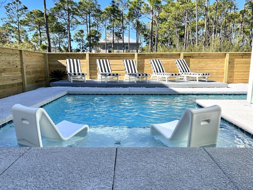 Welcome to the Luxury TURNKEY beach home of Villas of Frangista in Miramar Beach. Conveniently located in a gated community with a private HEATED pool and is within a short walk or golf cart ride to the beach and dining. The home is perfect for family living or rental investment. Sellers have recentlydesigned space as their vacation home/summer rental with new furnishings,new pool, new tanning deck, new fence, irrigation system, all new sod andmuch more. 17 Lakeland Drive is one of the few homes in the neighborhood that all four-bedroom suites have their own full bath and walk-in closet which is so convenient for guests and very appealing to vacationers. Attention to detail is very evident in this home with 10' ceilings, 8'' baseboardsthroughout, LVP flooring (NO CARPET), custom blinds