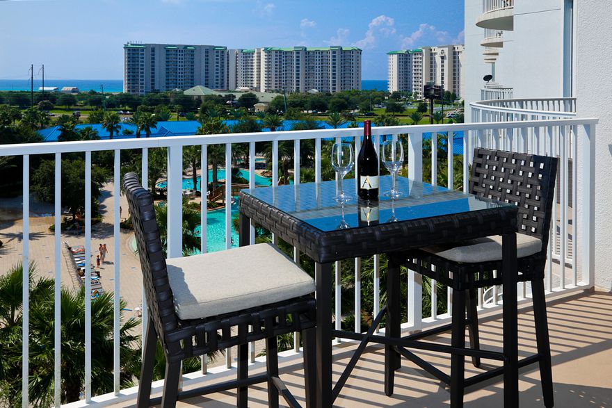 The Palms offers so many wonderful amenities, this is a great place for all seasons. Fabulous 11,000 sf lagoon pool with water falls and bridges along with shallow pool and splash area. This is one of the larger two bedroom units and is located on the 6th level with two balconies with ocean and lagoon pool views. This unit is equipped with granite countertops, black appliances, and many more upgrades. You'll love the convenience in access to everything with one of Destin's newest complexes. The conference center, on-site restaurant and Bean Trader selling everything from coffee to souvenirs will entice everyone to relax and enjoy their vacation. The association fees include all utilities including electricity, TV, and internet. Fantastic Rental History!