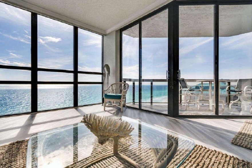 One of the most beautiful places to watch the sunset is on the balcony of this gulf view condo in Mirmar Beach.  The sunsets aren't the only things you will enjoy about this 3/3 condo!  The walls of glass allow you to have multiple views  of the gulf below.  This unit offers a one bedroom/one bath lock out option.  Currently income producing and booked as a 3/3.  Being sold fully furnished with bookings to transfer.  The amenities at Surfside include a pool, 2 hot tubs, fitness center, spa, basketball, pickle ball, and tennis courts.  A beach bar located steps away from beach chair service and seasonal bonfires.  The full service Royal Palm Grill is also on site.  Everything you need to live or play will be just outside your front door!  Beach front living at its finest!