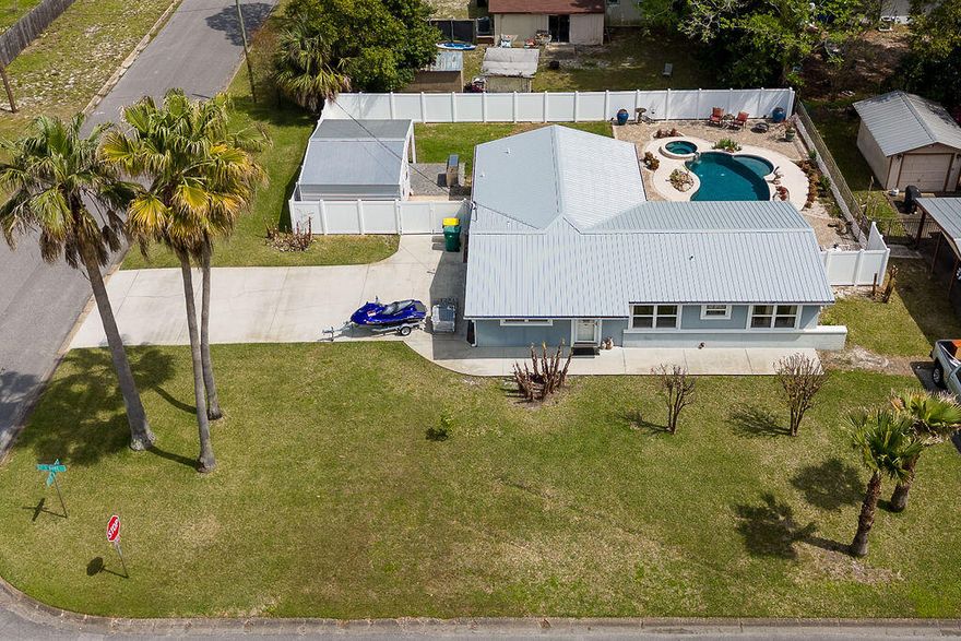 Welcome home to this piece of paradise with 4 BRs, 2 FBs and 1 Half Bath with BRAND NEW Metal Roof! Dive into relaxation in your own private in-ground gunite pool with a soothing spa, perfect for those lazy weekends or entertaining guests. The Half Bath is conveniently located off the pool area and there's an outdoor shower! Take a break from the sun under the covered patio area, surrounded by a fenced back yard for added privacy and security. Whip up culinary delights in the gourmet kitchen, a chef's dream come true! And guess what? No pesky home owners association to deal with! Plus, you're just minutes away from Hurlburt Field, making commuting a breeze. Don't miss out on this gem!