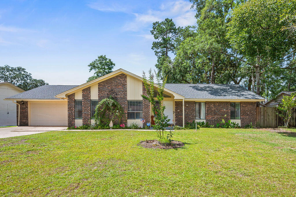 Welcome to 1016 Darlington Oak, where a comfortable atmosphere combined with a highly functional design brings relaxation and efficiency for daily routines and special occasions. This spacious, 2034 sq ft., 3-bedroom, 2-bath home PLUS a large Florida room has been loved and well- kept by the current owner. Its prime location makes this home a remarkable opportunity to own and live in the desirable area of Pinewood Estates in Niceville. From the moment you walk in, you'll love the airy and open feel this home brings. The large kitchen is filled with lots of natural lighting, plenty of white cabinets, marble countertops, stainless steel appliances, smooth cook top stove, and backsplash. The kitchen features a breakfast nook that opens to the spacious living area, perfect for casual meals and family gatherings. The owners installed the beautiful buffet in the dining room with plenty of cabinetry enhancing the appearance of this elegant looking area. Any family looking forward to enjoying their time together will find this home truly practical.
The living room provides an open look with fireplace, perfect for cozy nights. The large Florida room adds additional living space which can be used as an office area or can be a great place to enjoy a quiet morning or to relax after a busy day at the beach.
You'll find rich looking laminate flooring that looks like hardwood flooring and tile throughout the home, along with granite countertops in the master bathroom and the kitchen.
The large master suite easily fits a king size bed, the clean vinyl plank floors, all designed with comfort in mind. From the window overlooking the backyard one can enjoy a quiet evening and the nice a warm breeze.
The master bathroom is completely private and boasts a raised double vanity, stand-up shower, skylight as well as spacious walk-in closet. The shared bathroom in the hallway has a vanity, shower tub, and toilet. Celling fans in all rooms.
If you are in the mood for backyard entertainment, the large backyard is perfect for BBQs, backyard games, or letting the dogs run wild! The backyard is well-suited to add a pool! Sit and take in the view, listening to birds is all you need to melt away stress.
"The cherry on top" is NO HOA!!
Don't miss this opportunity to own this delightful home in the heart of Niceville! Prime location! Conveniently located within a short drive to many great restaurants and the most pristine beaches. Come see it today!