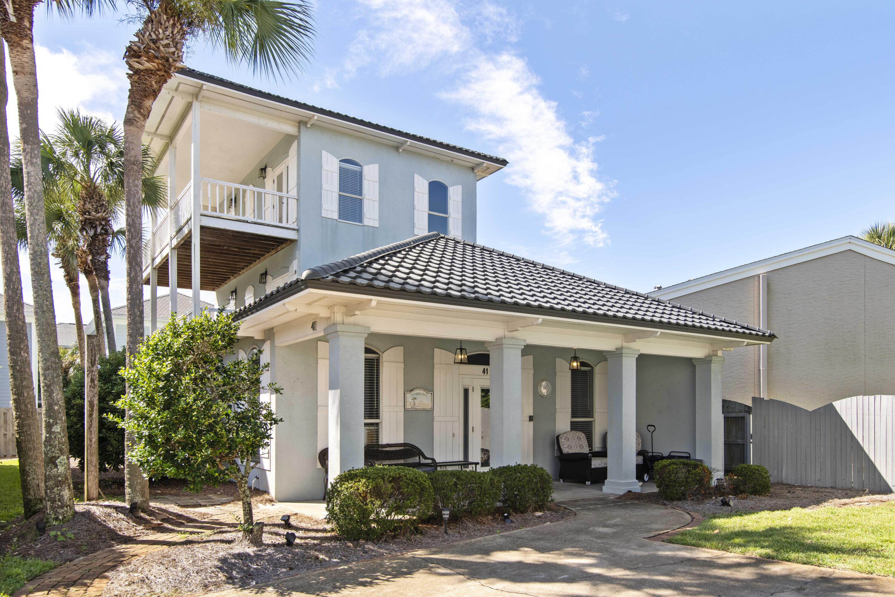 Amazing location and opportunity to own this beautiful, updated 4-bedroom beach cottage in the charming, gated community of Emerald Shores with deeded beach access! This home features a recently replaced $40k roof, new furnishings, and luxury vinyl plank flooring throughout the entire house! The open floor plan is ideal for entertaining in the formal dining area & additional seating at the breakfast bar. The kitchen features new stainless-steel appliances, deep double sink, ample cabinets, granite countertops and tiled backsplash. It is fully furnished with inviting coastal decor & flat screen TV's throughout and great outdoor spaces to enjoy from every bedroom!