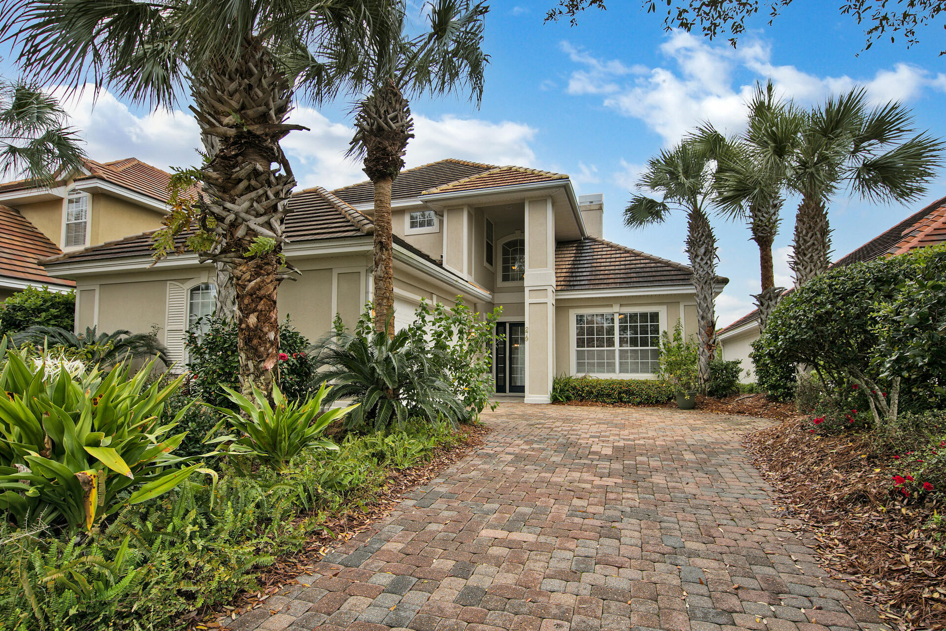 Newly renovated! This beautiful lake front property in the gated community of Regatta Bay is a large 2-story home complete with private pool and hot tub. This home is situated on a quiet cul-de-sac in the Sailmaker Village section of Regatta Bay. Several updates in 2021 include newly installed quartz countertops in kitchen and all bathrooms, new kitchen backsplash, new tile and luxury vinyl plank flooring on first floor and brand new carpet upstairs! The home has been freshly painted throughout in a coastal theme! The home also features a first level Master Suite, and a 2nd living space/media room with a second floor balcony overlooking the heated and spa and pool area.