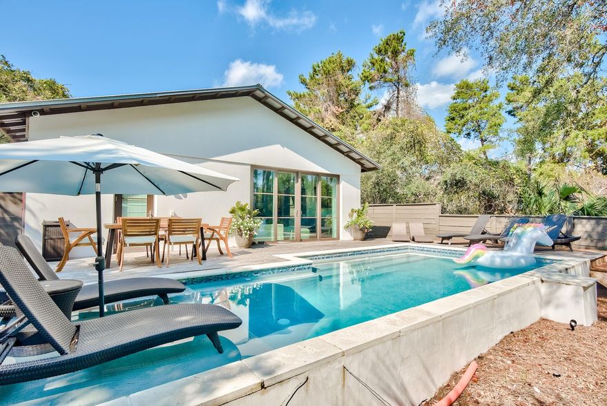 103 S Gulf Drive is located in Seagrove just two blocks from the emerald waters & sugar white beaches of the Gulf. It is just a bike ride from Seaside FL and just 5 miles from The Hub, Alys Beach, and Rosemary. The property is surrounded by dining, shopping, coastal dune lakes, pedestrian paths, state forest & nature trails (walking, running, biking). The home has 3 bedrooms and 2 full baths with a stunning heated pool, surrounded with lush landscapes and the sounds of the beach.