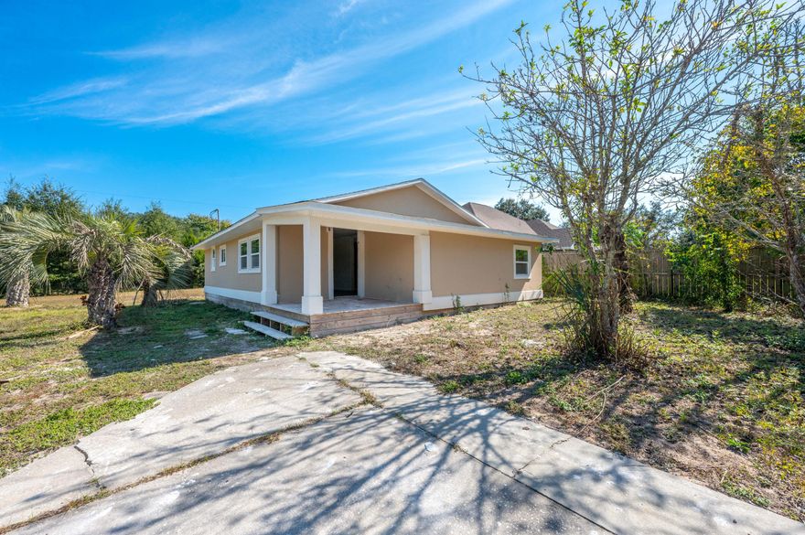 *CASH ONLY* Situated on a nearly half-acre corner lot, this unique property offers tons of blank-slate potential, and can be split into two lots. The spacious kitchen is ready for you to entertain, with new granite countertops and tile backsplashes, and a bumped-up breakfast bar overlooking the dining space. You'll enjoy the covered front porch as much as the open deck out back. Beautiful neutral wood-look vinyl plank flooring has recently been installed throughout the main living area and bedrooms. The primary bedroom has an en-suite bathroom that boasts new fixtures, a tile tub surround, and a modest walk-in closet. 2018 external condenser and 2022 internal air handler installed and new roof! Every space will also see a fresh coat of paint. Conveniently located off of Hwy 87,