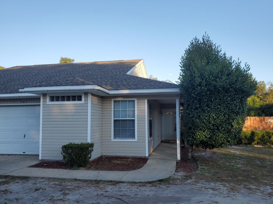 This delightful townhouse on a corner lot is convenient to both Eglin & Hurlburt. The home features tile throughout most of the house, wood laminate in the master bedroom, and carpet in the other bedrooms.  Roof replaced 2020. Recently painted. New carpet in bedrooms 2021.