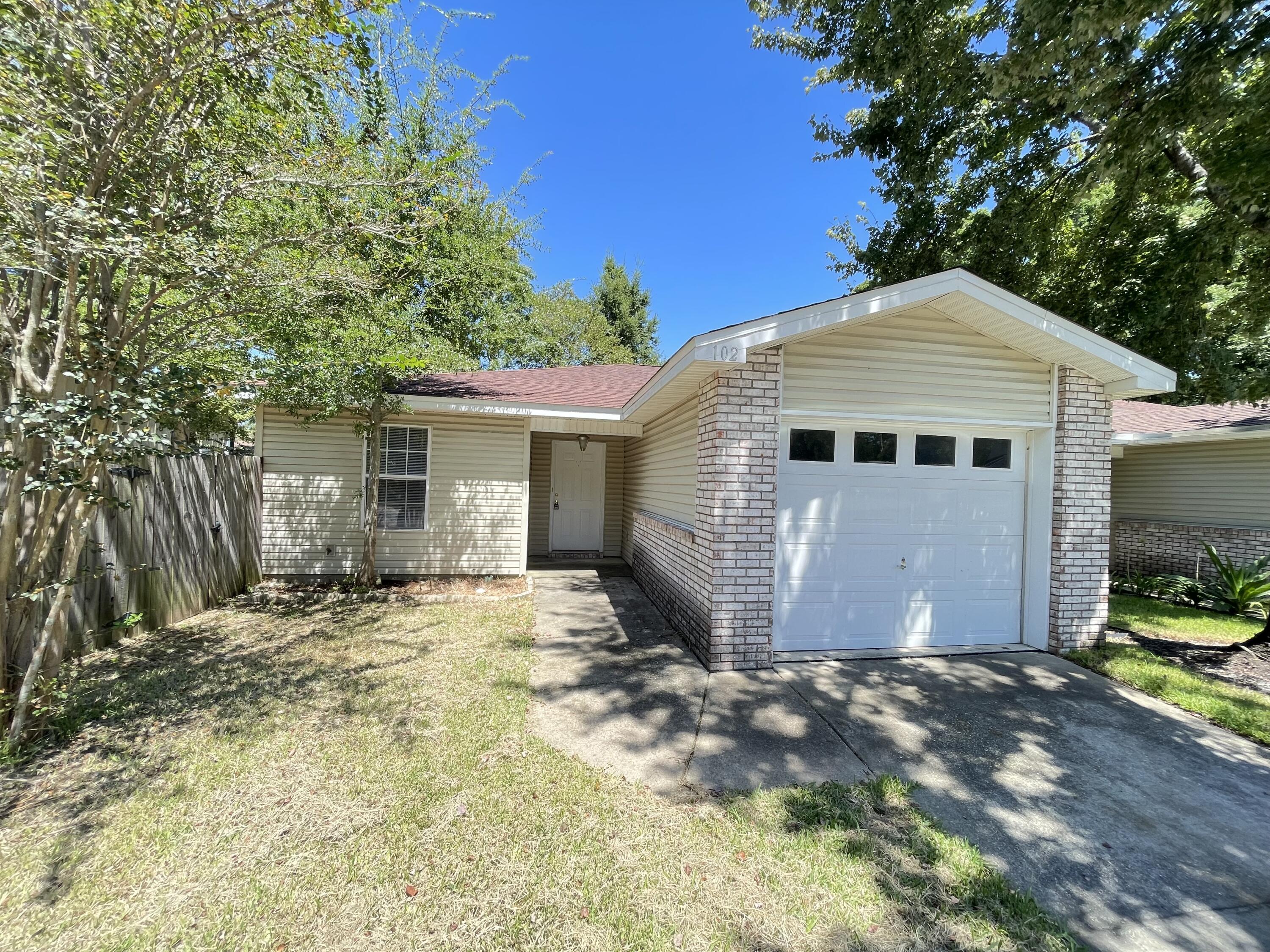 Two bedroom two full bath townhouse with a garage!! Freshly Painted with new LVP installed.  Large kitchen with a raised breakfast bar. Both bedrooms have attached full bathrooms with walk in closets. Large fully fenced backyard.