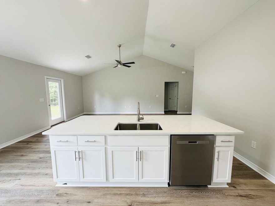 100 percent complete. Built by Local Parade of Homes winning builder. 4 bedrooms, 2 baths. Upgraded Lighting Package and Ceiling Fans in all bedrooms. A gorgeous light and bright palette of white and light gray/rustic flooring.Our garages are finished, painted walls, pull down attic stairs and automatic garage door openers. Preferred lender can close in three weeks.NO MONTHLY HOA FEES