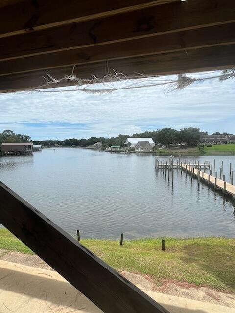 **CALLING FOR HIGHEST AND BEST BY FRIDAY AUG 26th. This is a Burned Water Front Unit. Just the shell is left along with the 2 side walls framed out. Per seller, Insurance will replace Electrical and Plumbing. Buyer will be Responsible for Finishing the Interior. Buyer to do their own Fact Finding by calling the Association with questions regarding the HOA Insurance Claim. Seller has No Prior Knowledge and Bought this Unit in it's Current Condition but must move on. All info provided deemed to be true and accurate. Buyer to verify.