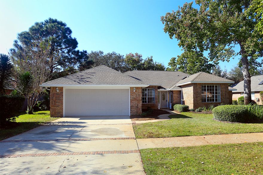 Just Updated! This gem is located in Emerald Breeze Estates and conveniently located near the Destin Commons. Back on the market and looking fantastic! New paint inside and out. New kitchen ceiling with recessed lighting and new range hoodPainted brick fireplace. New tubs and porcelain tile shower walls. New marble countertops in bathrooms. New vanity sinks and mirrors in bathroomsNew lighting and fixtures throughout house. New luxury waterproof vinyl flooring by coretec (Blackstone) with a Lifetime warranty transferable to new owners throughout entire house except kitchen! The neighborhood is well maintained and has no HOA to deal with! There is a deeded walking path to the beach. It will only take you five minutes to reach the beautiful Gulf! A new roof was installed in April 2008...