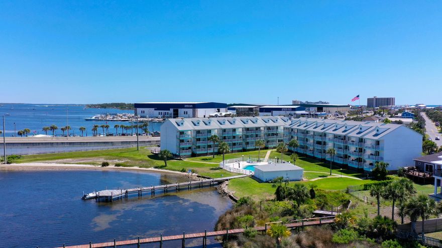 Welcome to 3600 Thomas Dr D302, a stunning waterfront condo that offers the perfect blend of relaxation, investment potential, and unbeatable views. Whether you're looking for a turnkey vacation rental or your own coastal retreat, this property is ready to impress.Step inside to find an open and airy floor plan with soaring ceilings and a spacious loft that comfortably fits two queen beds, making it ideal for hosting guests or maximizing rental income. Large windows fill the space with natural light, while a private balcony overlooks the Grand Lagoon, creating the perfect spot for morning coffee or sunset cocktails.With a prime location, generous living space, and top-tier amenities, this condo offers the perfect blend of  comfort and coastal living.$4000 towards buyers concessions.