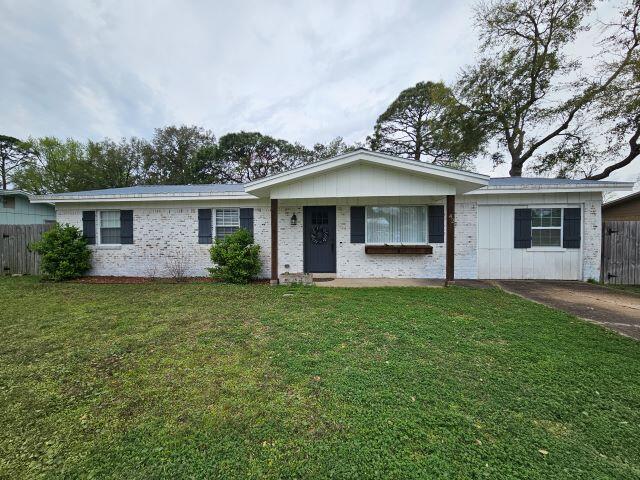 AVAILABLE 10/24/25-Beautifully remodeled 4 bedroom 2 bath home nestled in the heart of Ft Walton Beach. Just minutes from Eglin AFB, Hurlburt Field AFB, shopping, schools and the world's most beautiful beaches! Gorgeous white washed brick exterior, metal roof and a large fenced in backyard with a shed for extra storage. Granite countertops, stainless appliances and a large, open floor plan are just a few of the highly desirable features. Small dog allowed 25 lbs. or less with owner approval and paid $400 nonrefundable pet fee. Prospective tenant to verify all items of importance including room measurements and school zones. NO SMOKING, NO VAPING. Credit and criminal background check required for all occupants age 18 and older. 24 hour notice required for showings.
