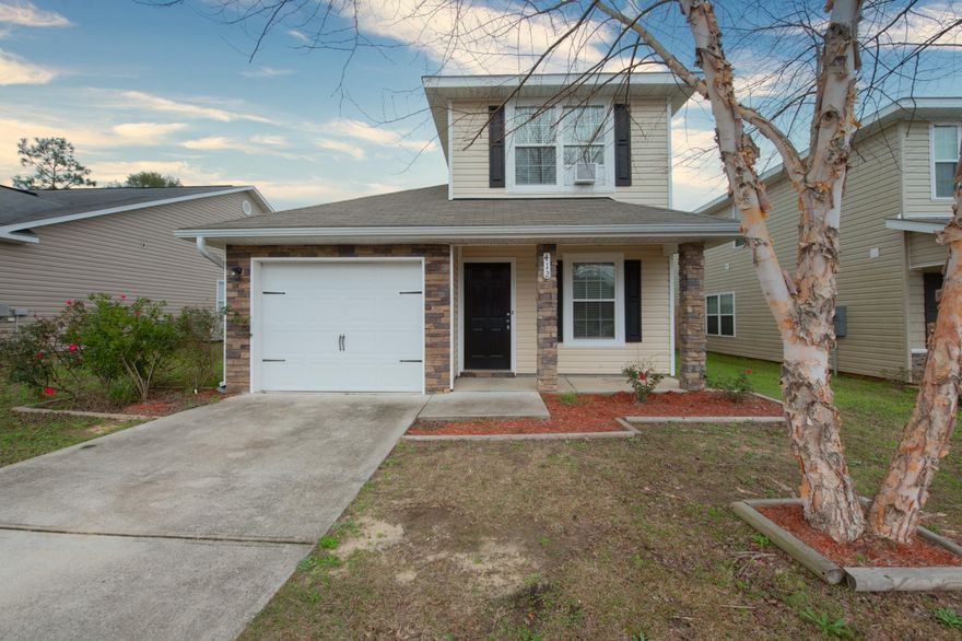 This BETTER THAN NEW property boasts 4 bedrooms and 2.5 baths with a wide open floor plan downstairs. BEAUTIFUL wood-look tile throughout the main living areas and kitchen. The kitchen features stainless steel appliances, a large breakfast bar and tons of counter space. The main level is perfect for entertaining. The master bedroom is also located on the main level, along with a half bath and a spare bedroom. Upstairs you will find an additional bathroom with two large bedrooms. There is a spacious den in between both of the spare bedrooms upstairs as well. The backyard features tons of green space and a fenced in yard. Schedule your showing today!