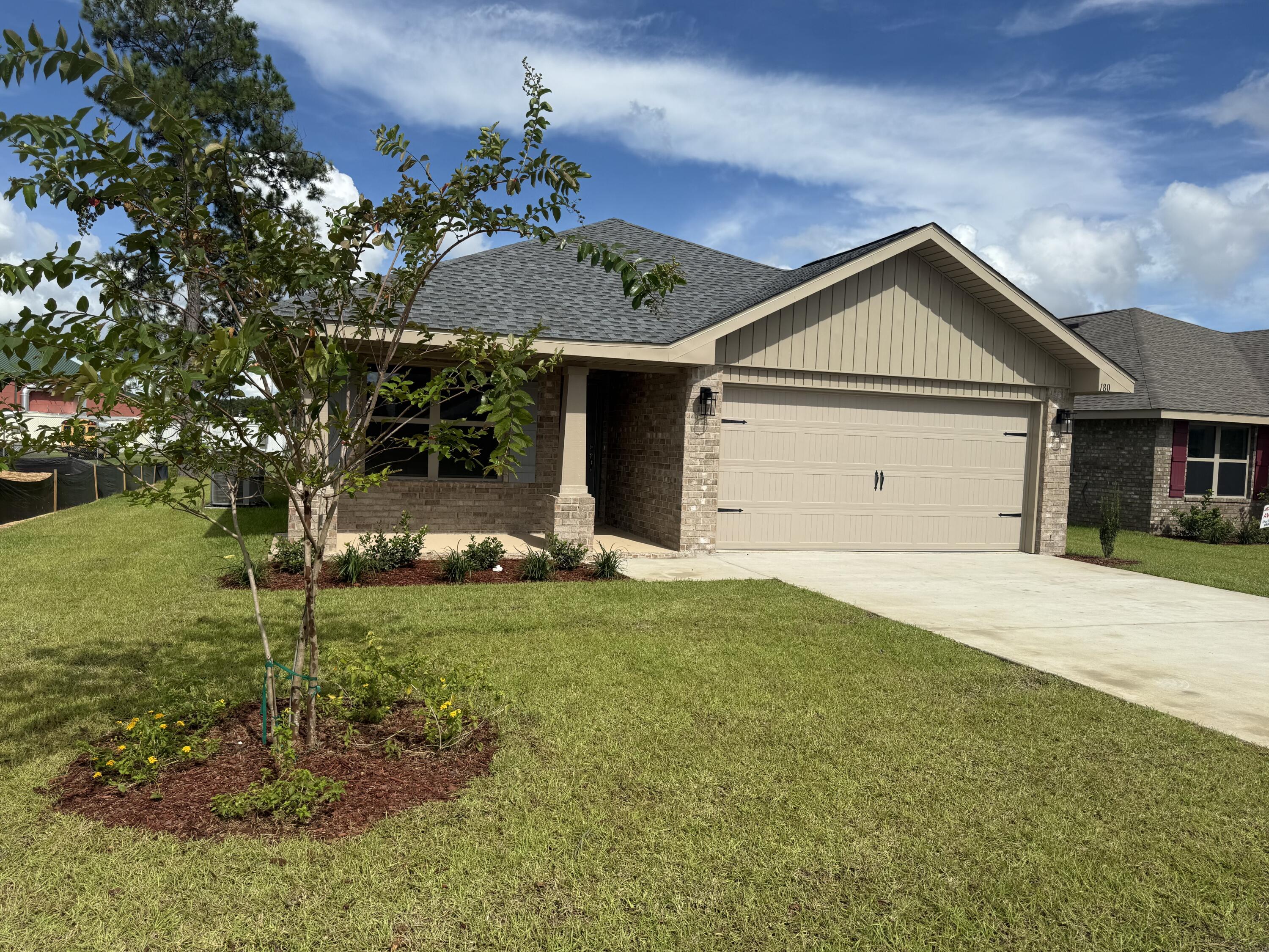 Don't let 1425 sq ft fool you! This home comes with 3 bedrooms and 2 full bathrooms. The family room is open to a breakfast area and dining room making for a very open floor plan. The kitchen has a granite covered island and a pantry. Appliances are stainless steel and match well with the LVP flooring and all wood hand crafted cabinetry. The family room opens to the 15.5' x 13.5' covered porch. The master bedroom has a ceiling fan and trey ceiling. The master bath has dual vanities and granite countertops. The 5' walk in shower has been placed in lieu of a tub. This home is 4 sided brick and comes with irrigation, fully sodded and landscaped. There is ample dining and shopping in Crestview and schools are A rated. This home also comes with a 10 yr, Bonded Builders warranty.