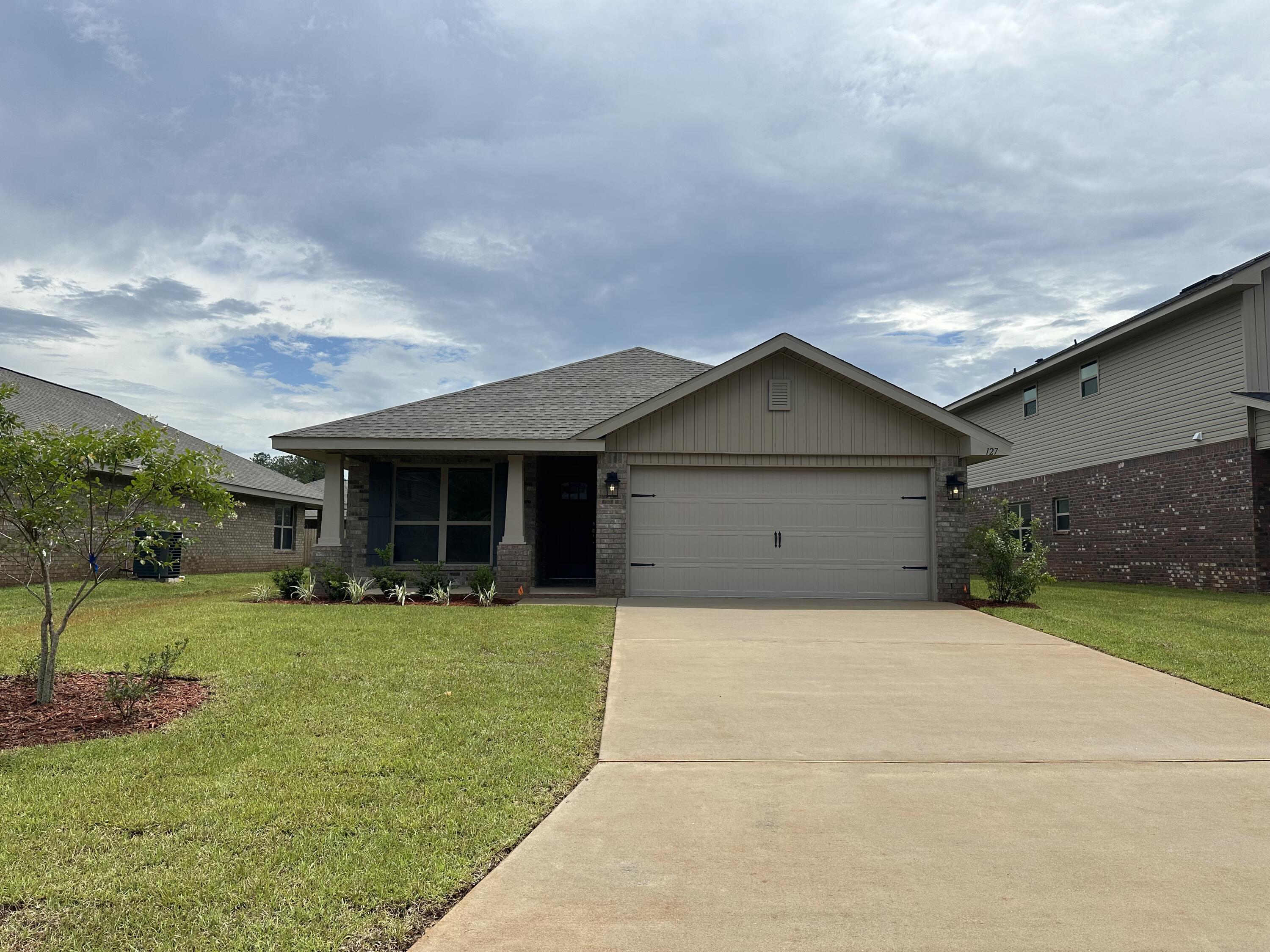 Don't let 1425 sq ft fool you! This home comes with 3 bedrooms and 2 full bathrooms. The family room is open to a breakfast area and dining room making for a very open floor plan. The kitchen has a granite covered island and a pantry. Appliances are stainless steel and match well with the LVP flooring and all wood hand crafted cabinetry. The family room opens to the 15.5' x 13.5' covered porch. The master bedroom has a ceiling fan and trey ceiling. The master bath has dual vanities and granite countertops. The 5' walk in shower has been placed in lieu of a tub. This home is 4 sided brick and comes with irrigation, fully sodded and landscaped. There is ample dining and shopping in Crestview and schools are A rated. This home also comes with a 10 yr, Bonded Builders warranty.