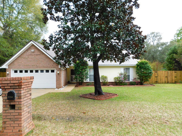 This perfectly located home is nestled in the live oaks of Savannah Lane and is priced right. One of the most sought after locations, this home allows for a very quick commute to the Army 7th SFG, Duke Field, Eglin AFB and the white sandy beaches of the Emerald Coast!The exterior features a detached workshop built to match the home, a large screened in sun porch, metal roof (2003), wood fence privacy, automatic in ground sprinkler system and a 465 ft. deep well. The well services the entire property inside and out plus public water is used for the home, while the well services the lawn. The interior has been extensively upgraded with wood laminate and tiled floors.