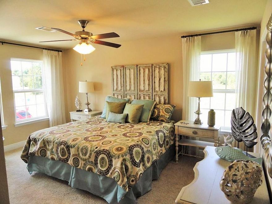 Affordable and low maintenance with this new townhome. Close to Interstate 10, HWY 85, schools, hospital and Walmart. Home comes with a 1 year builder and 10 year structural warranty. Pictures are of a similar home. Listing Broker/Sales Person has ownership interest in the property. Square footage dimensions are approximate.