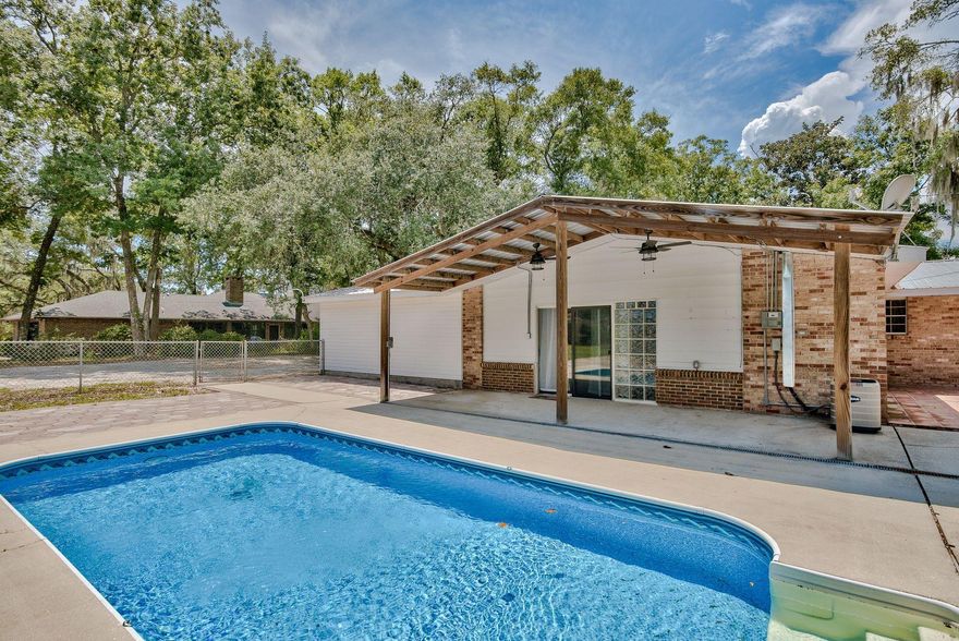 This is an As-Is property.This home boasts an in-ground swimming pool. It is on 1.02 acres which gives plenty of room for a boat and RV storage. Close proximity to Eglin and Duke Field. New flooring and trim throughout, freshly painted, updated kitchen, and Master Bath.Truly a perfect spot for family gatherings with an open floor plan, covered back patio, and pool. The workshop has water and electricity for the DYI lovers!An open patio with fire pit to enjoy the evening under the stars. There are several marinas along Bayshore Drive, with local waterfront restaurants. Enjoy the Boggy Bayou via land or boat or on foot along the sidewalks of Bayshore Drive.