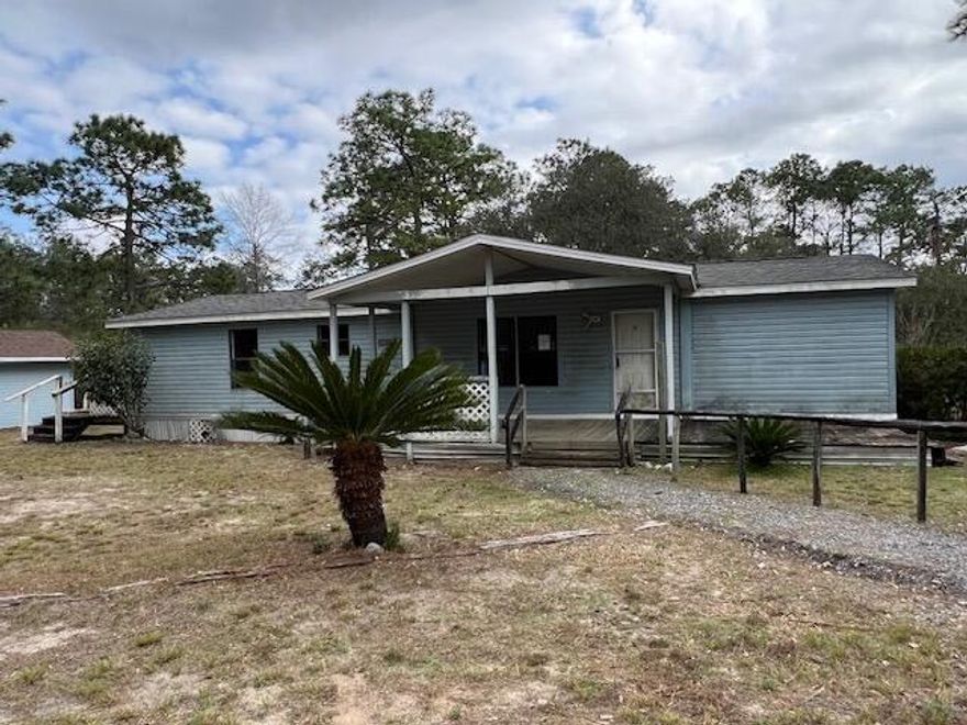 Looking for Country living and some space; this HUD REO home is one to put on the list. Resting on just over 2 acres, this 3 bedroom 2 bath split bedroom mobile home was built in 1992. Home has a large galley kitchen/dining combo area and a large living room with a fireplace. Master bedroom is just off the living room and additional bedrooms and full bath are opposite the kitchen/dining area. Home does needs some repairs, but is insurable with escrows (IE). Call today!