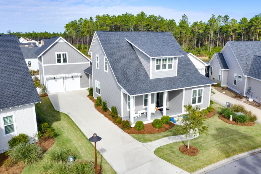 Meticulously maintained and beautifully designed Custom Home. Situated on the bend of a serene pond in the back and a community park in the front in a construction complete area of Origins, this is truly an incredible opportunity to own the quintessential Florida home. This home comes with a highly coveted St. Joe Beach Club Membership and approved DRB plans to add a pool in the private backyard! When you first walk in, you will immediately notice the ten foot ceilings, how bright, welcoming and eloquent this home really is. Every detail was obsessed over and the list of upgrades is longer than a summer night. In the master, you'll revel in the morning light as it soaks into the shiplap accent wall and pours into the gorgeous quartz floors and countertops of the master bathroom.