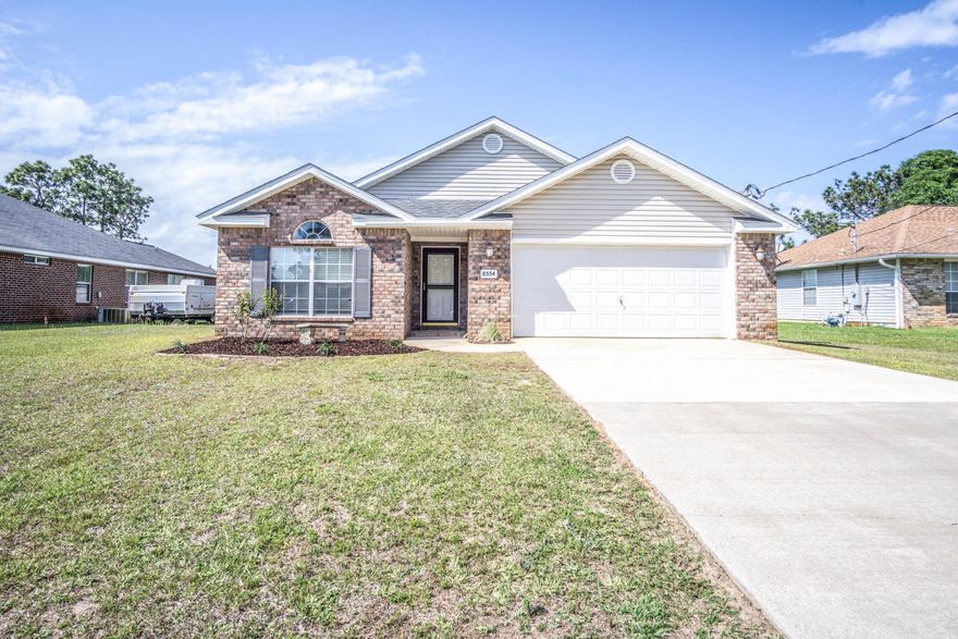 LOCATION, LOCATION, LOCATION! BRAND NEW ROOF! This spacious well appointed 4 bedroom 2 bath home with updated flooring features a split bedroom design, an open concept floor plan with a great flow, plenty of space, and a LARGE fenced backyard with irrigation system and patio.The master suite features a large walk in closet and a master bath with double sinks and sit down makeup area, Garden Tub, and separate shower. If you are looking for an affordable home that is READY NOW, don't miss out on this one. Act fast, this home will not last