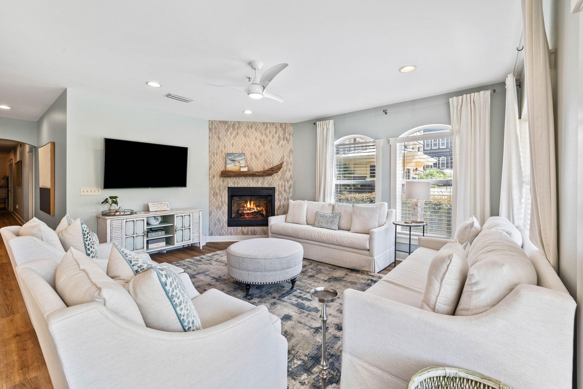 Located in the heart of Seagrove Beach, this exceptional three-bedroom dwelling in Seaview Villas offers the perfect blend of condo living and luxurious coastal features. With deeded beach access, this ground floor unit provides convenience and easy access to the pool and beach right from your private back patio. The open layout of the kitchen, living, and dining areas fills the space with natural light, creating a welcoming atmosphere for gathering and unwinding after a day exploring the renowned 30A and its pristine sugar white sand beaches. The kitchen is fully updated, boasting modern finishes and top-of-the-line appliances.
The primary suite is expansive and features a king bed, walk-in closet, and a spacious ensuite bathroom with dual vanities, a separate stand-alone shower, and a luxurious soaker tub. Down the hallway, you'll find two large guest bedrooms. The first bedroom offers a king bed and an ensuite bathroom, while the second bedroom features a queen bed, twin-over-twin bunk beds, and a full bathroom with shared access to the living area.
Professionally decorated with furnishings from Beau Interiors, this ground floor condo exudes luxury and style. Seaview Villas is a private, gated community with elevators, although this unit's convenient location eliminates the need for them. With deeded beach access and a prime location in Seagrove Beach, this property offers the ideal 30A getaway.