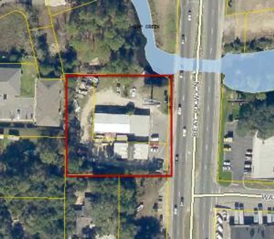 Mixed-use property that includes 2 flex spaces totaling 6,450sf. Currently owner-occupied for a retail tenant on month-to-month. Survey available in Documents section.