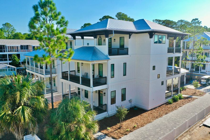 Gorgeous brand new (2024), fully furnished coastal luxury home with 6 bedrooms, 6 bathrooms, 2 half bathrooms, an elevator, ample parking and a detached single car garage less than a 3 minute walk to the beach! This 3,692 sq. ft. home on Montigo Avenue in Seagrove Beach will comfortably sleep 22 people, and the rental projections exceed $215K annually. Designed with entertaining and families in mind, the first floor features the large, inviting great room with a designer kitchen, oversized island and beautiful dining room. Enjoy a gas stove, two dishwashers, farm sink, Mongram Appliances and seating for five at the island. The first floor also includes a bedroom suite with a private bathroom and a half bath. Outdoor entertainment rounds out the first floor with a beautiful patio, pool and deck area just outside the living room doors. The detached garage provides privacy, in addition to pool storage. Back inside, take the stairs or elevator to the second floor to find the main guest suite floor. There are three guest suites with private bathrooms and a fourth guest suite with a hallway bathroom. The master suite awaits your arrival on the third floor, featuring vaulted ceilings, generous closet space, and a gorgeous master bathroom with a soaking tub, shower and double vanity. The third floor also hosts the entertainment room, large laundry room and additional half bath. Enjoy oversized patios and outdoor gathering areas throughout the home. Seagrove Beach is located along the famous 30A corridor in South Walton. Enjoy endless dining, shopping, arts and attractions close by, not to mention white sand beaches and the emerald waters of the Gulf of Mexico less than a three minute walk from the home. 