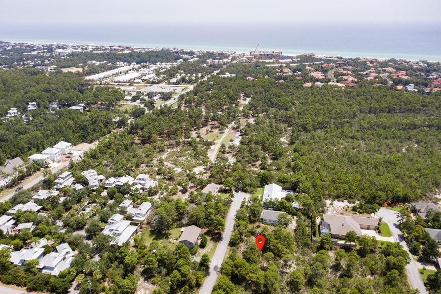 42 foot elevations! This .34 Acre vacant lot is partially cleared and in X flood zone meaning no flood insurance required. No HOA fees, No Build out time. Close to Ed Walline Park county beach access and Gulf Place shopping and restaurants. This lot is nestled high and dry in the Santa Rosa Ridge Subdivision. Close enough to take your golf cart to the beach or to have dinner at Gulf Place. Survey available.