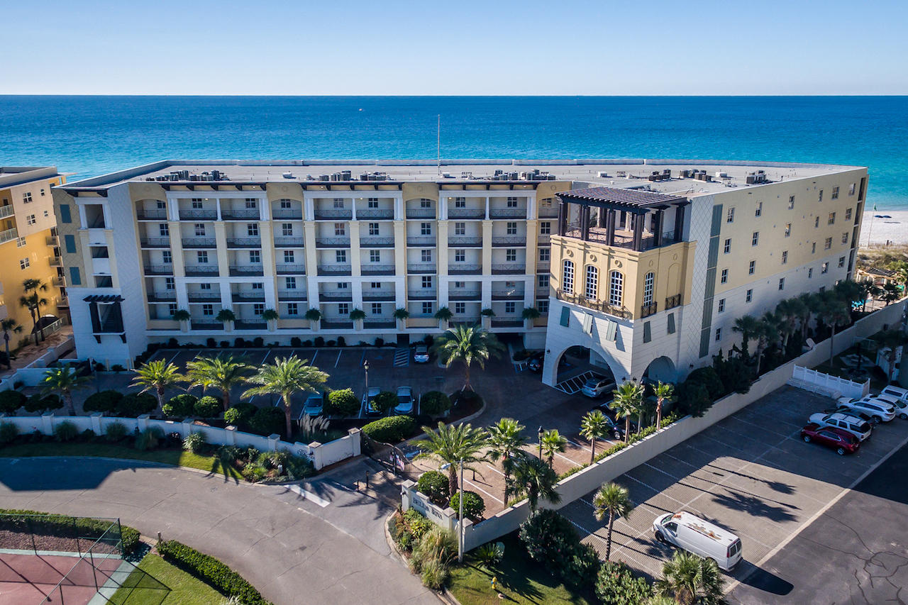 Bella Riva of Okaloosa Island is one of the most impressive beachfront condominium communities that exist on the Emerald Coast of Florida, which offers sensational views of the Gulf of Mexico! This exclusive 45-unit complex is gated with a private beach walkover, beautiful beachfront and rooftop terraces with heated pool and hot tub, and fitness studio, all surrounded with lush tropical landscaping that complements the Mediterranean design of the architecturally-magnificent and beautifully maintained building. This luxurious, fully furnished, 3 bed, 3 bath, 2,491 SF residence has never been rented and was finished utilizing the finest materials, including 18 chipped-edge travertine floors, granite countertops, stainless steel Viking appliances, 6-burner gas cooktop with exhaust hood,..