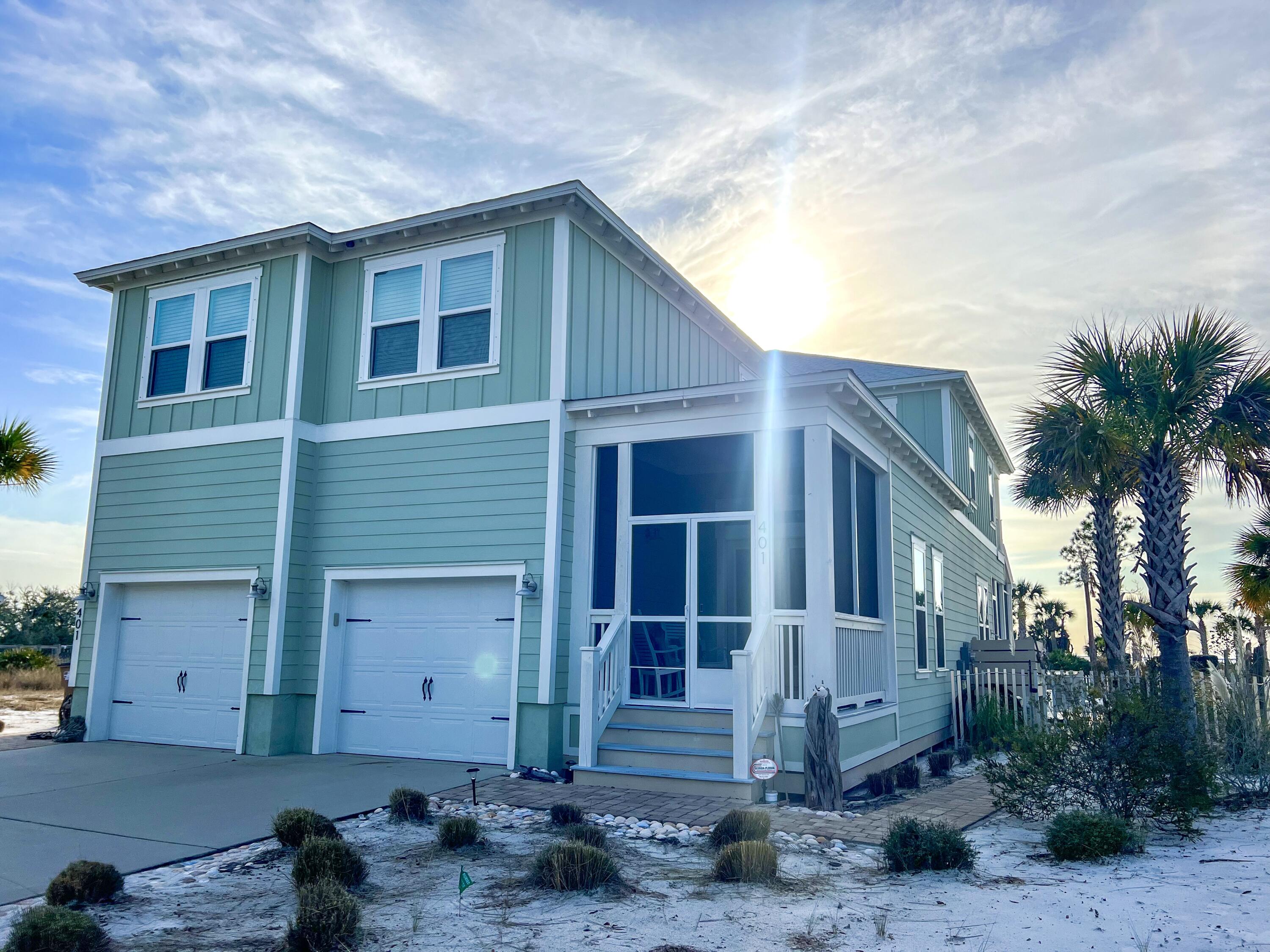 Immerse yourself in turnkey luxury with unobstructed views and glorious sunsets sinking into the waters of the Gulf of Mexico and St Joseph's Bay. Located in the coveted Windmark Beach Community, this beautifully decorated home is truly a rare find. Unlike most beach homes, this property has never been rented and has been the homestead residence for the owner since purchasing new in 2019. Larger than most of the surrounding homes and boasting bedrooms and baths with over 3000 sq ft of well design space that is complemented with screened front and back porches as well as master suite covered balcony that affords year round breathtaking sunsets. A large xeriscape gulf view backyard is complete with a pool, volleyball court, and generous lounge space that is all secured by