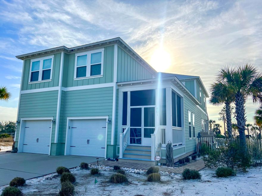 Immerse yourself in turnkey luxury with unobstructed views and glorious sunsets sinking into the waters of the Gulf of Mexico and St Joseph's Bay. Located in the coveted Windmark Beach Community, this beautifully decorated home is truly a rare find. Unlike most beach homes, this property has never been rented and has been the homestead residence for the owner since purchasing new in 2019. Larger than most of the surrounding homes and boasting bedrooms and baths with over 3000 sq ft of well design space that is complemented with screened front and back porches as well as master suite covered balcony that affords year round breathtaking sunsets. A large xeriscape gulf view backyard is complete with a pool, volleyball court, and generous lounge space that is all secured by