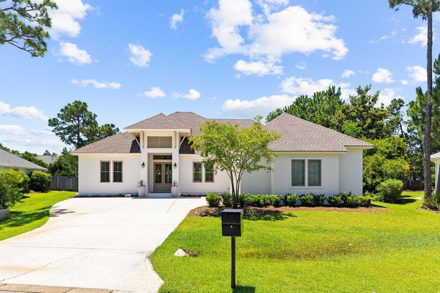 *Under contract with 72 hour kickout* Welcome to 51 Morning Sun Court, a custom-built 4-bedroom home exuding elegance & luxury.  Newly constructed in 2019, this home is situated in the desirable Pelican Bay community, minutes from Choctawhatchee Bay.  This single-level residence features an open-concept floor plan and a spacious, fenced backyard.Upon entry, you are greeted by an expansive living area with soaring 14-foot cathedral ceilings with a cast stone mantle, and Pecky cypress accents in the foyer that extends to the kitchen and formal dining area.  The kitchen is equipped with quartz countertops, hood range, breakfast bar, and KitchenAid appliances. The master suite offers dual walk-in closets with built-in dressers and custom shelving.  The luxurious master bathroom features two two separate vanities, standalone tub, and large walk-in tiled shower. Additionally, the home includes three guest suites and two full bathrooms, all appointed with quartz countertops and ceramic tile. The laundry area, just off the garage entrance, is outfitted with full countertops, a sink, and penny tile. The fenced backyard, with ample space for a private pool, is perfect for entertaining. This property is a rare gem in Santa Rosa Beach, featuring a meticulously maintained lot and proximity to schools, Grand Blvd, and the Gulf of Mexico. Pelican Bay amenities include a bayfront community park with a dock, picnic tables, and pickleball/tennis courts.