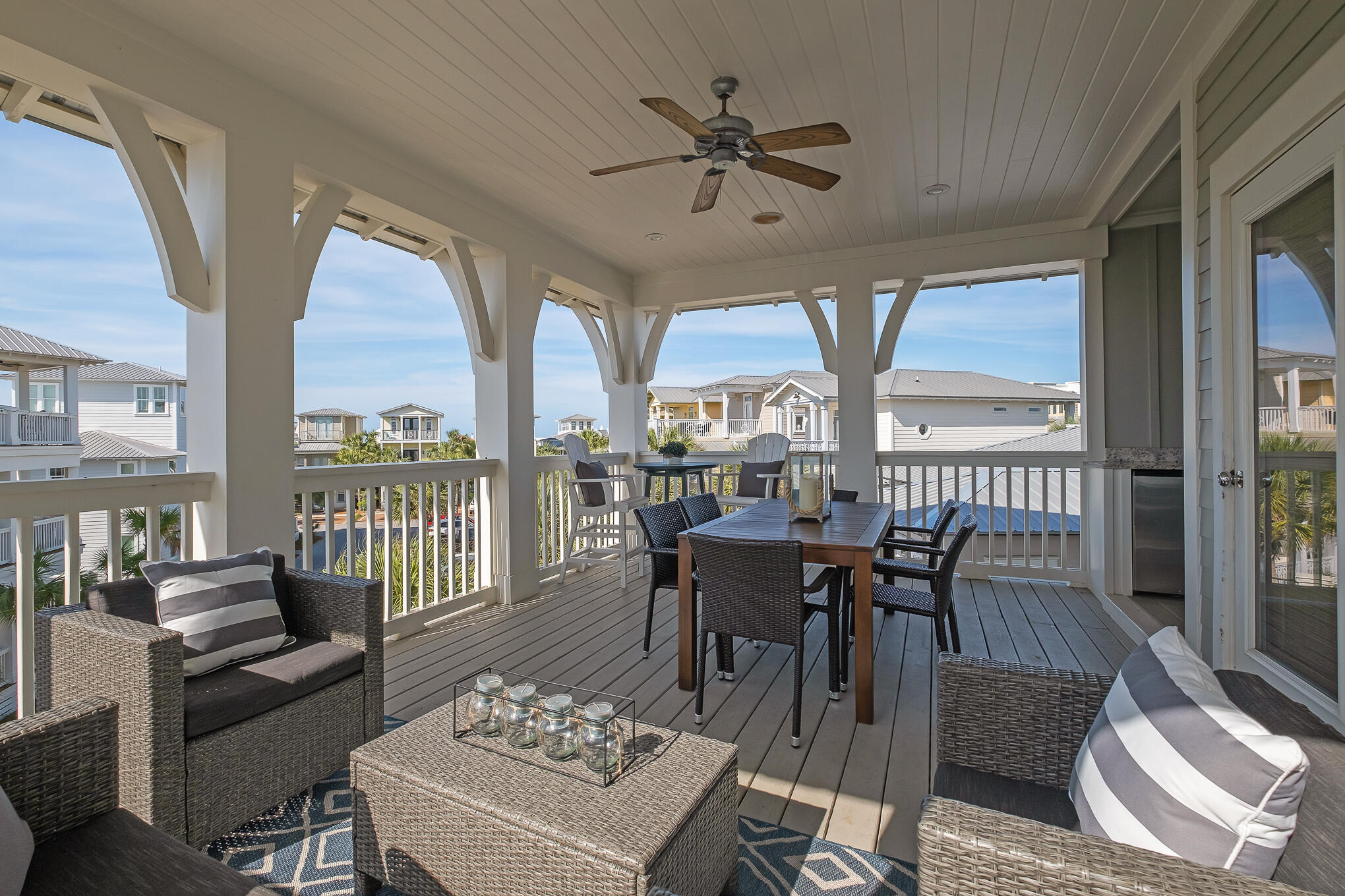 Location and views combine at this three-story beach home, nestled in the heart of 30A's east end. This four-bed, 3.5-bath home is designed for alfresco living with gulf views from the huge entertainment deck on the top floor. Designed for social gatherings, it has a spacious seating area and a covered summer kitchen with built-in refrigerator and appliances. It's the natural place to relax at sunset, laughing and chatting while steaks and burgers sizzle on the barbecue. This custom-built home is ideal as a second home or vacation rental. It has ample parking and shallow steps leading up to the traditional front porch. Inside, the high-end finish wows with gorgeous hardwood flooring, designer lighting and an open-concept floorplan with cozy fireplace.