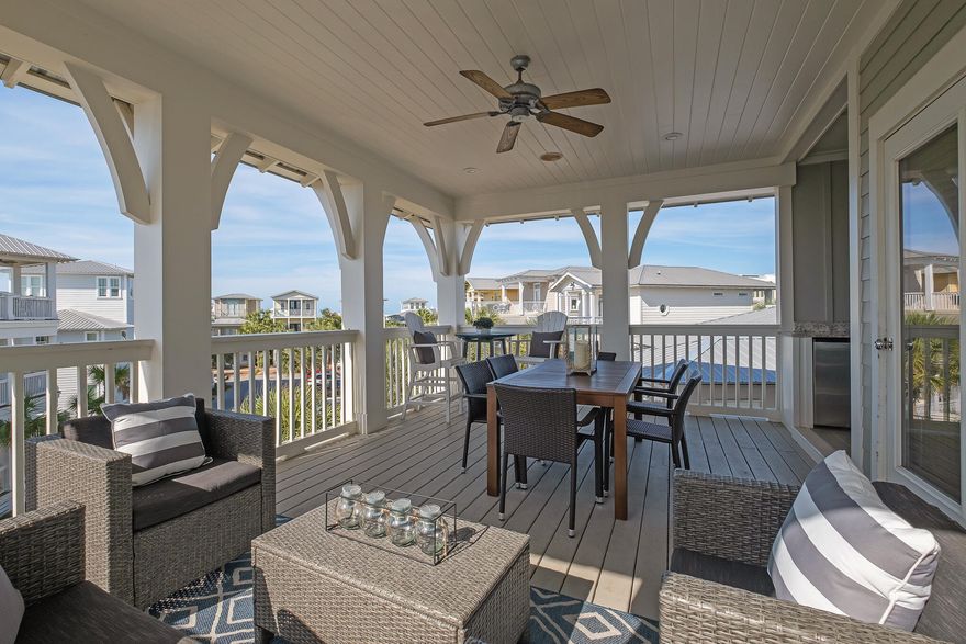 Location and views combine at this three-story beach home, nestled in the heart of 30A's east end. This four-bed, 3.5-bath home is designed for alfresco living with gulf views from the huge entertainment deck on the top floor. Designed for social gatherings, it has a spacious seating area and a covered summer kitchen with built-in refrigerator and appliances. It's the natural place to relax at sunset, laughing and chatting while steaks and burgers sizzle on the barbecue. This custom-built home is ideal as a second home or vacation rental. It has ample parking and shallow steps leading up to the traditional front porch. Inside, the high-end finish wows with gorgeous hardwood flooring, designer lighting and an open-concept floorplan with cozy fireplace.