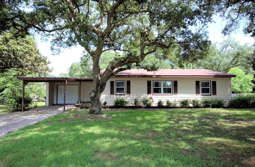 Turnkey home completely renovated ready for new owners. Everything inside has been upgraded, DO NOT let the age of this home fool you. This home sits on a nice corner lot. It features new windows, doors and fixtures, floor to ceiling. The kitchen has porcelain tile floors maple cabinets, 36 inch uppers, crown trim, self-closing drawers, granite counter top and stainless steel appliances. The family room has a gas fireplace with logs, crown molding new carpet and ceiling fan. The French doors led to a large raised deck. There is an inside laundry room. Both guest and master baths have tile flooring along with the shower and bath tub surround. Both bathroom vanities feature granite tops and new fixtures. There is a fenced back yard with a lawn pump and sprinkler system. There is an attached