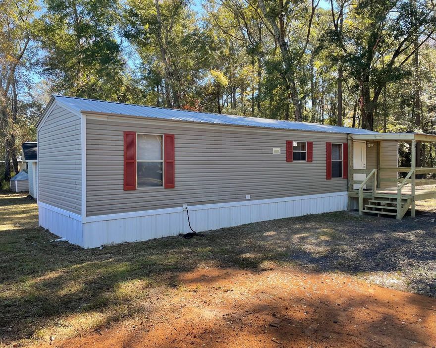 VERY NICE AND CLEAN 2 BR/ 1BA HOME JUST OFF BLACK CREEK ROAD. LARGE 1/2 ACRE LOT. NEW FRONT COVERED PORCH. LARGE LIVING ROOM AND KITCHEN AREA. UTILITY AREA WITH WASHER AND DRYER(NOT WARRANTED) TWO STORAGE SHEDS IN BACK YARD. PLENTY OF ROOM FOR PARKING.