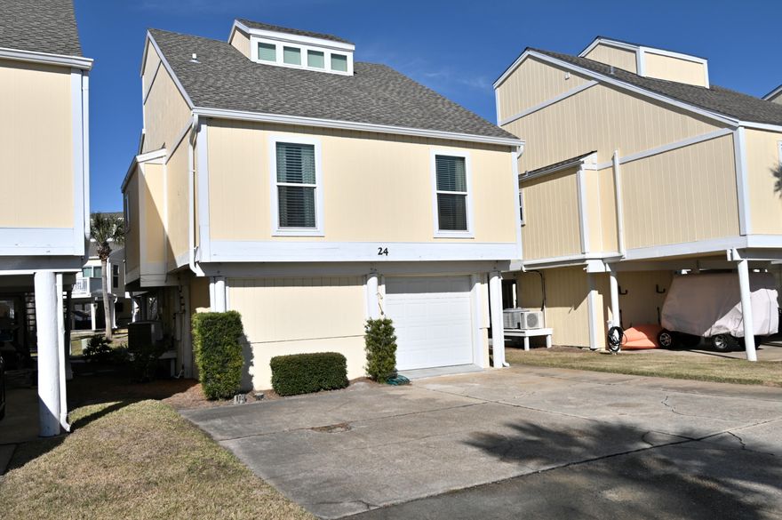 SELLERS WILL PAY FOR REMAINING SPECIAL ASSESSMENT AT CLOSING! Escape to paradise in this spacious 3-bedroom, 3-bathroom villa nestled within the popular Sandpiper Cove community. With its prime location just steps away from the sugar-white sands and emerald waters of the Gulf of Mexico, Villa 24 offers a perfect blend of comfort and coastal charm.  The villa boasts an open and airy floor plan, with tastefully decorated interiors that create a welcoming and serene atmosphere. Ample windows allow natural light to flood the space, showcasing the coastal-inspired decor.  The enclosed garage has a bathroom and King-sized Murphy bed.  It also has separate heating and air conditioning from the main living area.