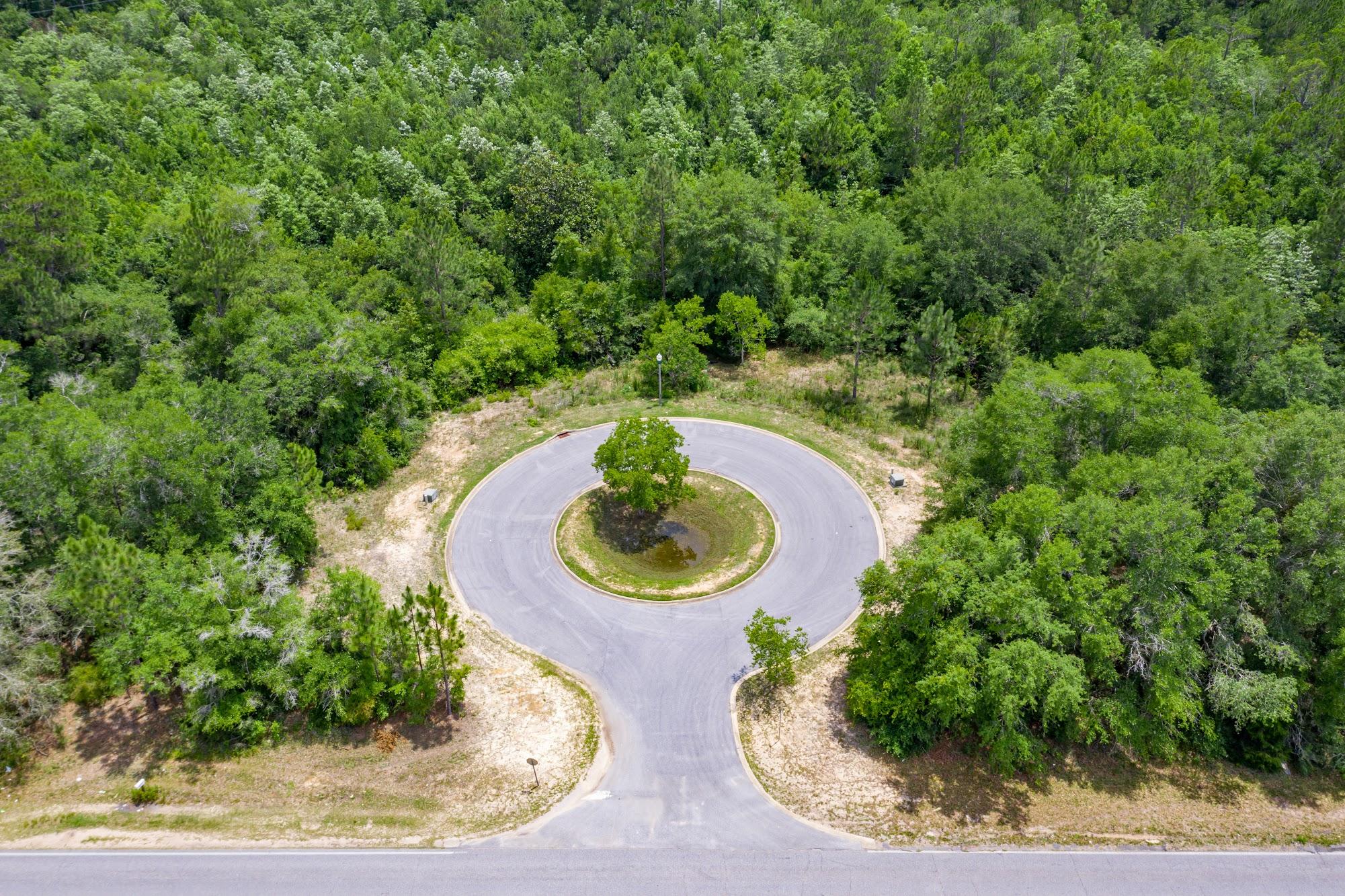Beautiful Lot located in the sought after Lakeridge Estates Community Development. This development has underground utilities and a beautiful community lake with a fishing dock. This lot is more private as it is actually outside of the main development in a 4 lot Cul-de-sac.