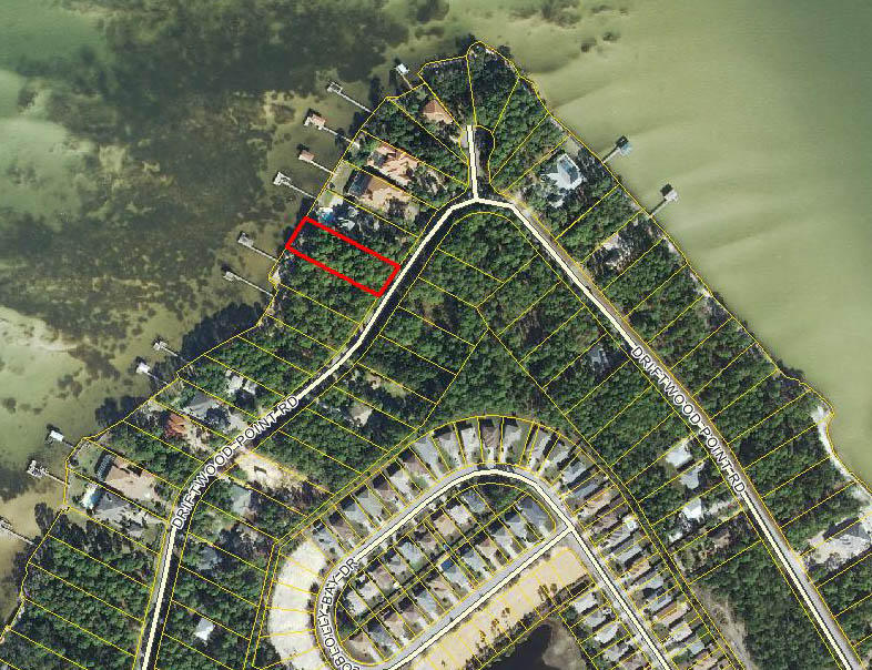 RARE AND UNIQUE! Breathtaking bayfront home site on beautiful Choctawhatchee Bay with beautiful live Oak trees less than 2 miles to Baytowne Marina in Sandestin & 12 miles to Crab Island and the Gulf of Mexico by water. There is an astounding 100 feet of bay frontage with sea wall and rip rap! The property is oriented to the west offering spectacular sunset views!