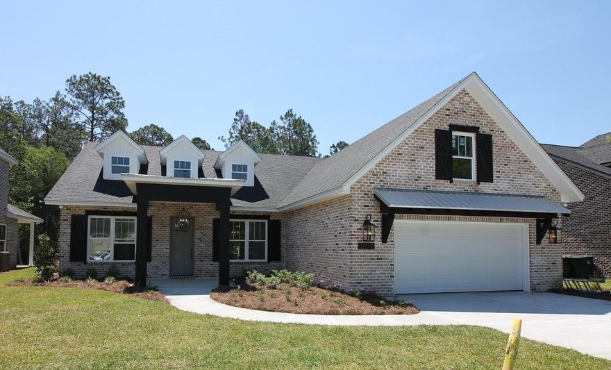 Stunning New Construction Home in Hawks Landing. Custom cabinets, quarts counter tops, large open floor plan. Beautiful spacious floor plan with fireplace. Open concept kitchen spacious for the growing family in one of the most sought out neighborhoods in Bay County. Under ground utilities, sidewalks, close to schools, shopping and in the heart of Lynn Haven. This home has a second living area upstairs as well as a bonus room and extra bedroom. The master and 2 bedrooms and an office are on the ground floor. This is a MUST SEE and the price has just been Reduced! Call me today to see it.