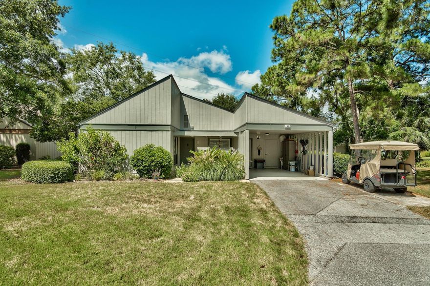 Here's the ultimate opportunity to enjoy the privacy and comforts of your own detached home with all the luxuries of condo living. Because this home is deeded as a condominium, the association maintains the landscaping, exterior maintenance and insurance, grounds keeping, trash, security gates, and more. The interior of this home is nearly flawless with new stainless steel appliances, granite counters, marble tile throughout the entire home, updated/contemporary coastal bathrooms, and plantation shutters on all the windows. Every room is bright, spacious and inviting. The living space continues outdoors on the large patio overlooking a nicely manicured green space. Enjoy private, shaded parking under the carport with additional storage space.